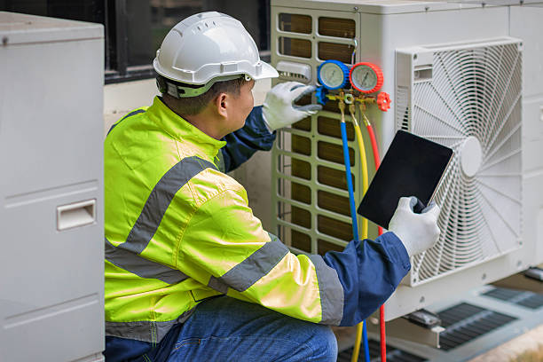 Professional Air Conditioning Repair technician working in Plumsteadville, PA